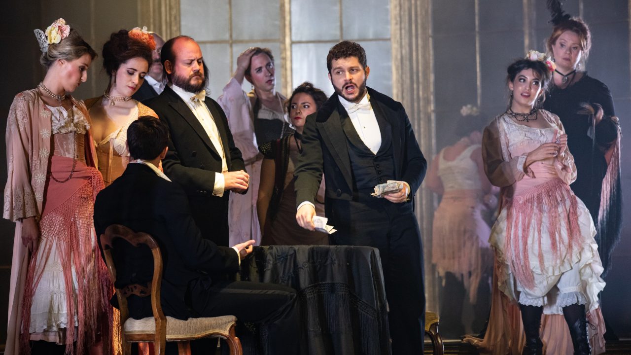 Matteo Desole as Alfredo with Members of the Opera Holland Park Chorus in La Traviata, 2021 © Ali Wright