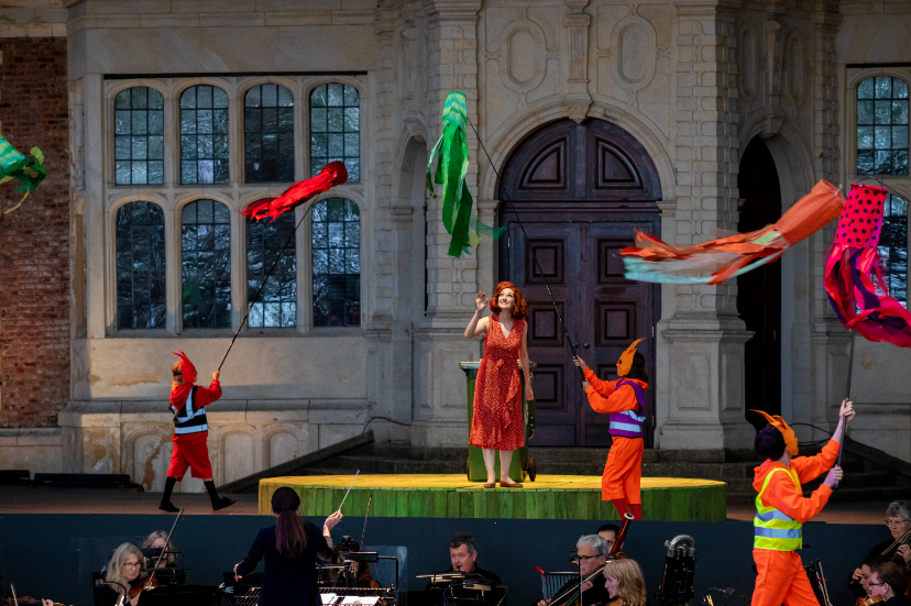 Jennifer France as The Vixen with members of the Children’s Chorus in The Cunning Little Vixen at Opera Holland Park, 2021 © Ali Wright