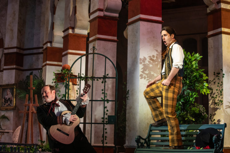 Paul Grant as Figaro and Elgan Llŷr Thomas as Count Almaviva in The Barber of Seville, Opera Holland Park 2024